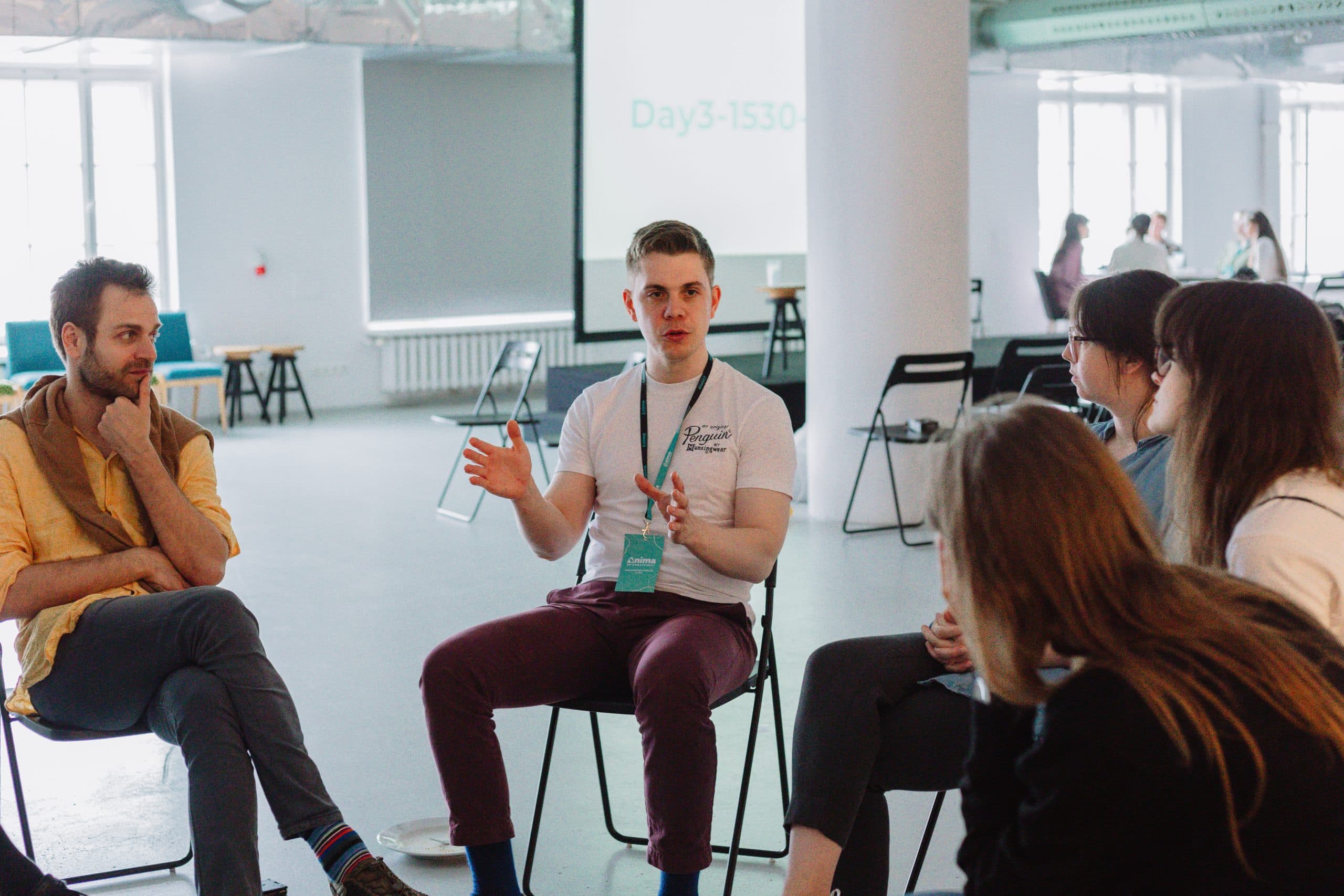 Anima campaigner Paul Retallick engaging in discussion with other campaigners.