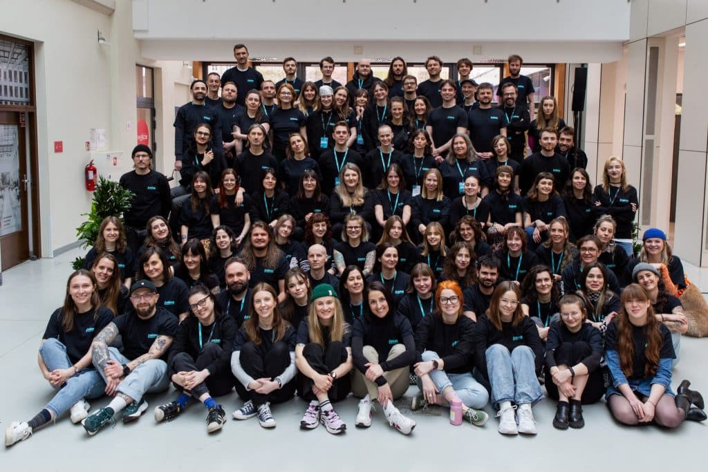 All of Anima International's team of 100+ people, smiling at the camera.